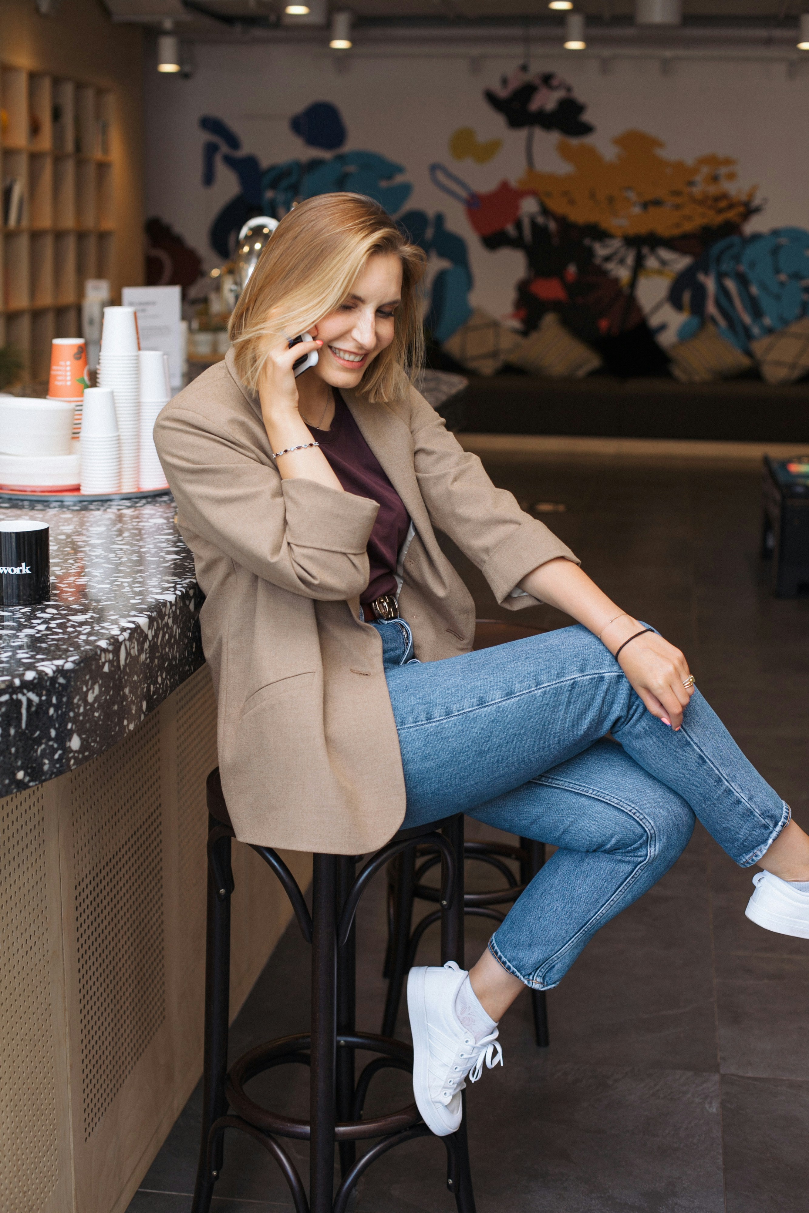 Woman smilling talking on the phone